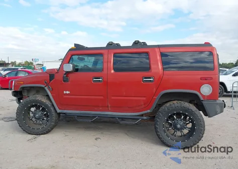 2003 Hummer H2 z USA, uszkodzony, nr VIN 5GRGN23U13H122297